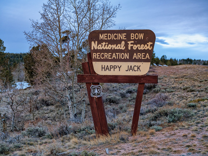 a sign reading "Medicine Bow National Forest Recreation Area Happy Jack"